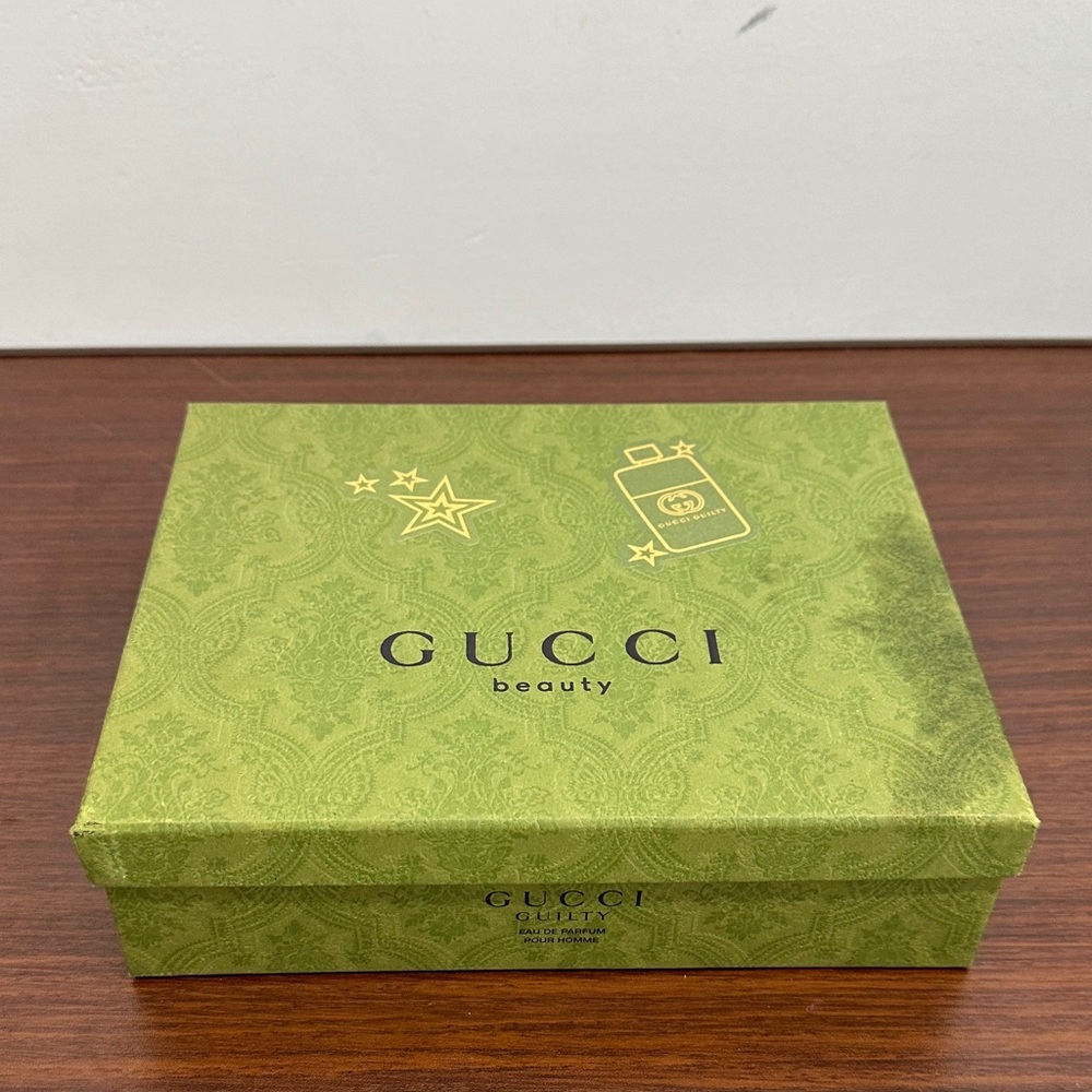 Gucci Guilty Eau De Parfum Pour Homme Green Gift Box with Gold Details.
